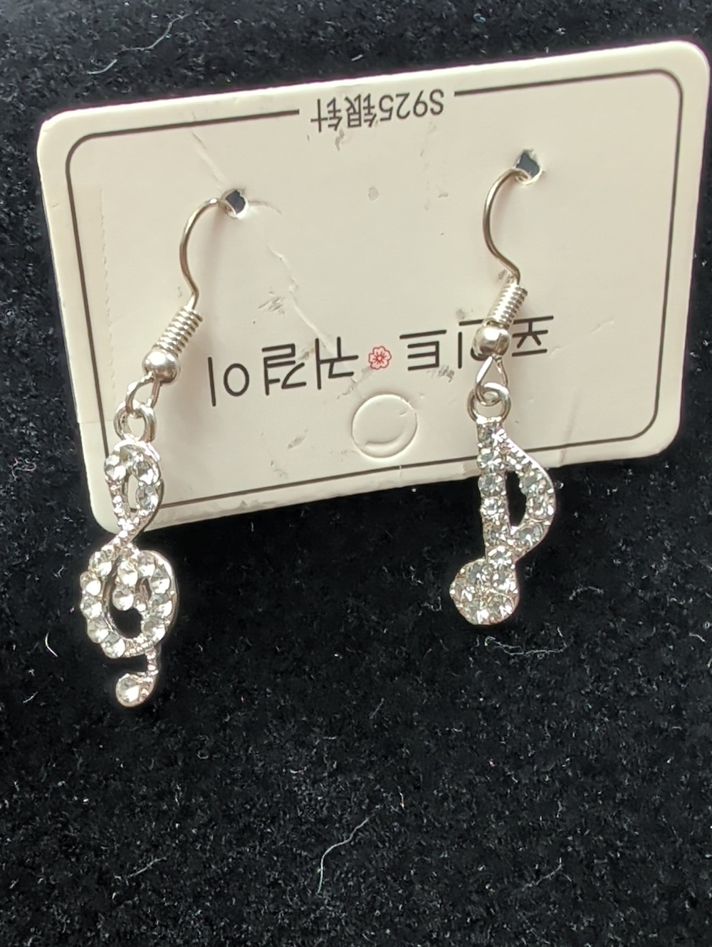 (#69) Music note dangle earrings adorned with sparkling rhinestones.